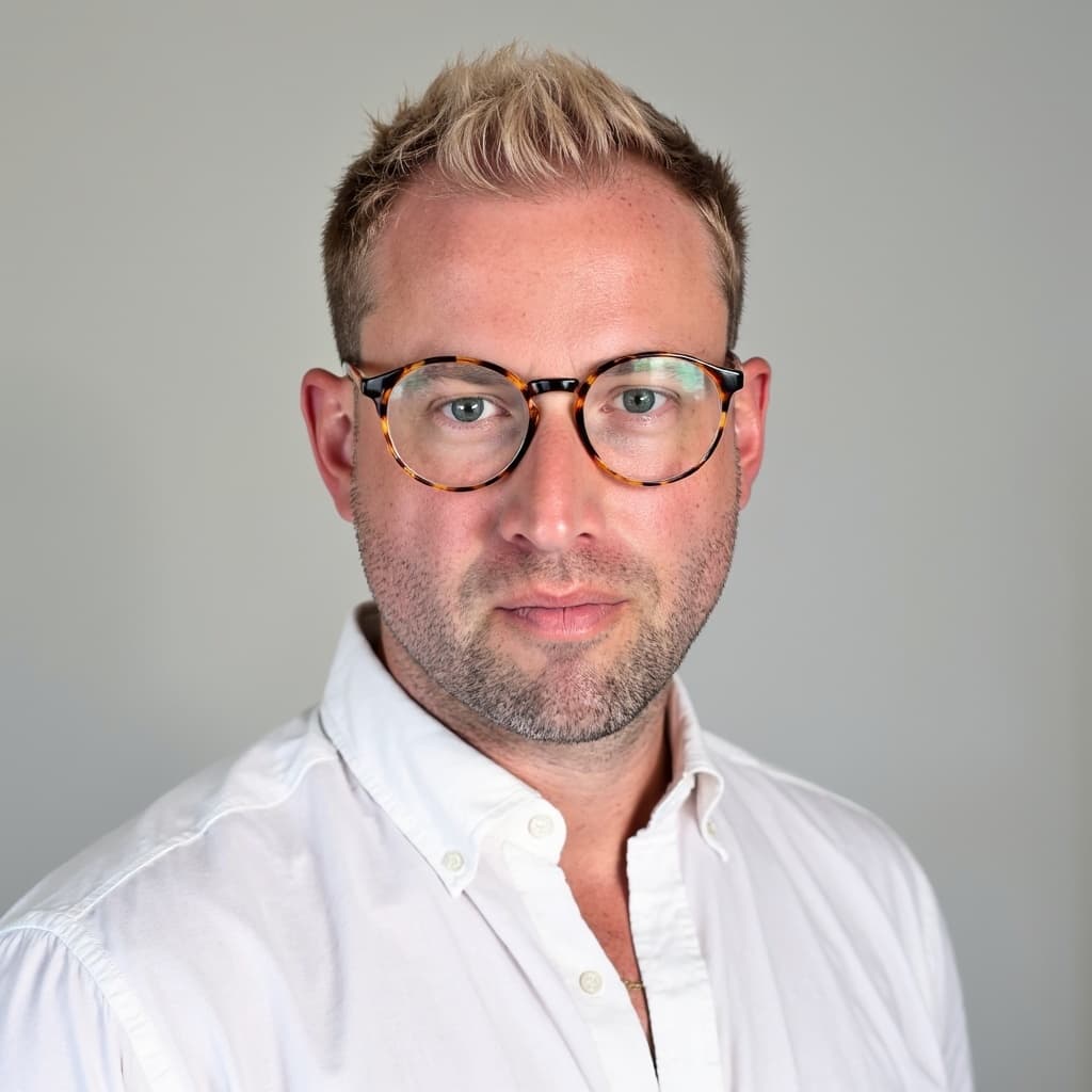 Professional portrait of Adam Nicholson